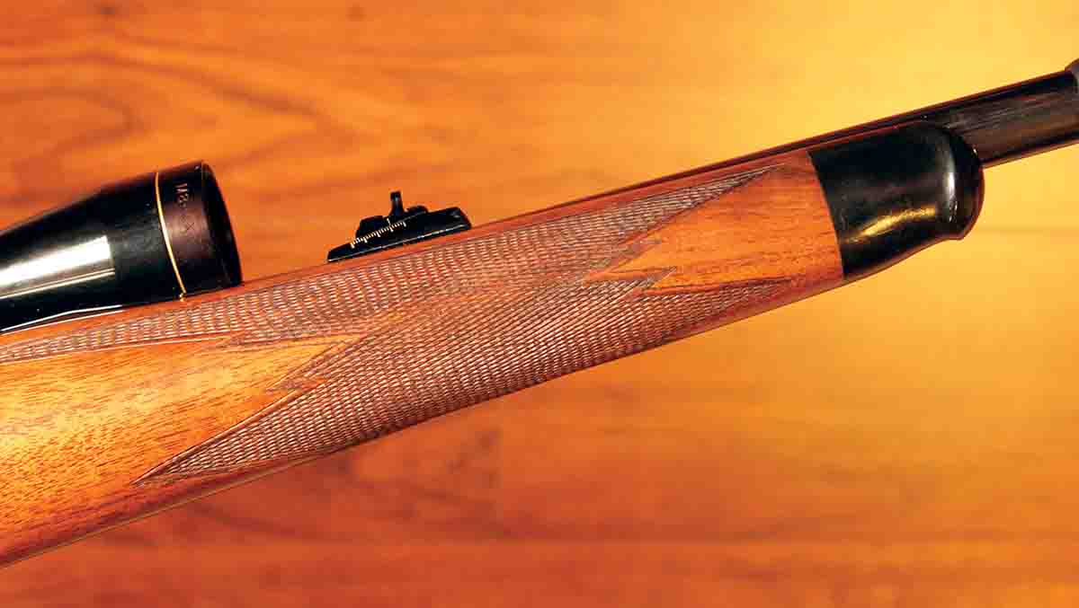 The .30-06’s stock is made out of nicely-figured walnut with fine, bordered checkering wrapping around the forend, yet the only marks on the metal are the cartridge-stamp on the barrel, the serial number and G.33/40 model designation on the action.